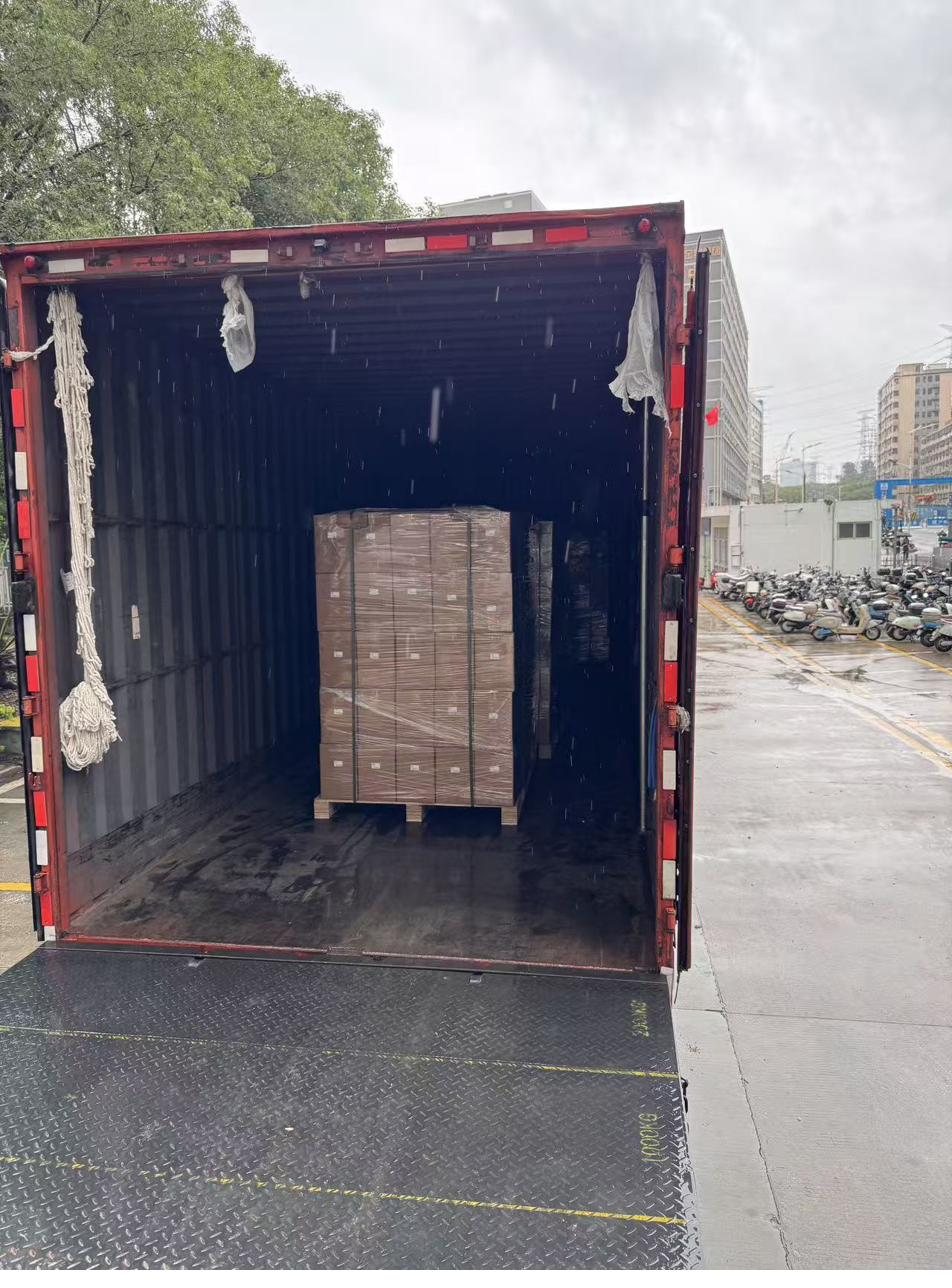 Pallet of OPS PC modules loaded into a shipping container for export