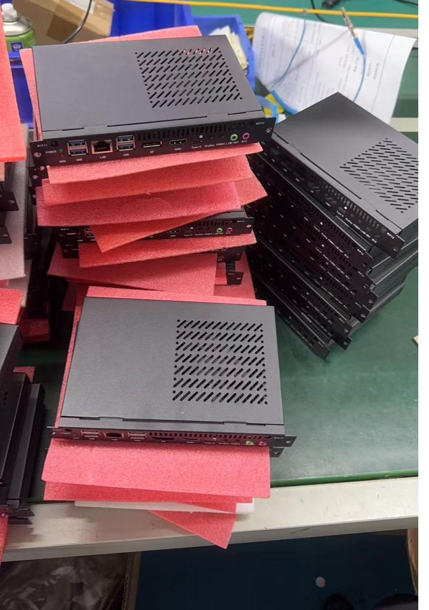 Freshly produced OPS PC modules stacked on the line at the Shenzhen factory